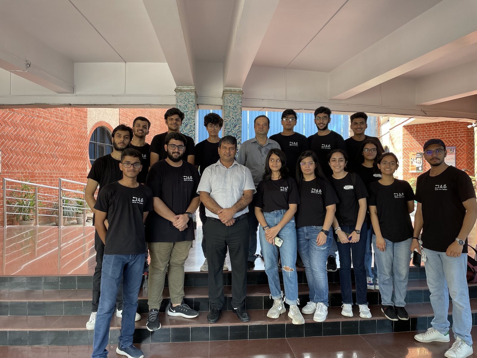 Akshat with a large group of collaborators