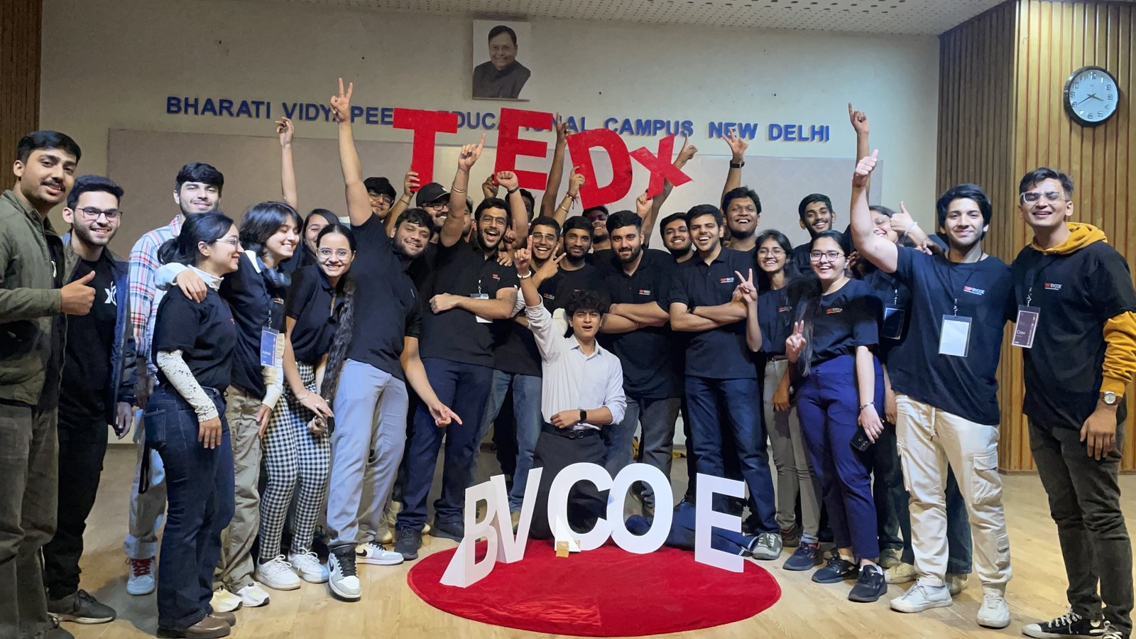 Akshat with a large event team